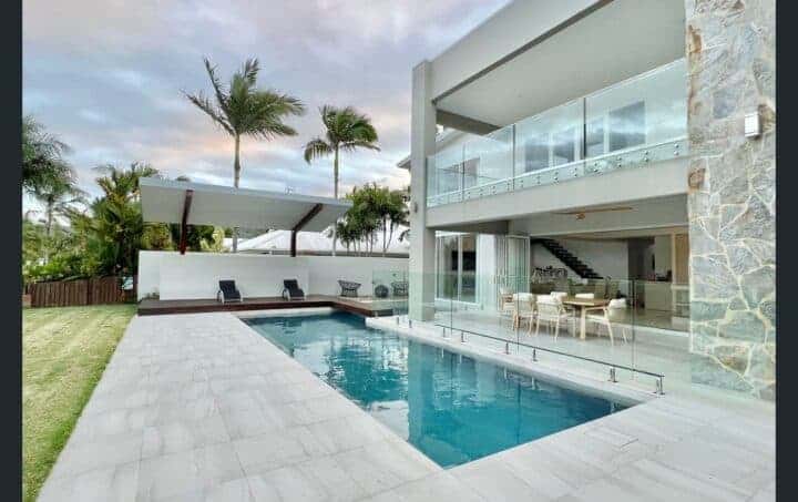 Photo of beautiful swimming pool and house